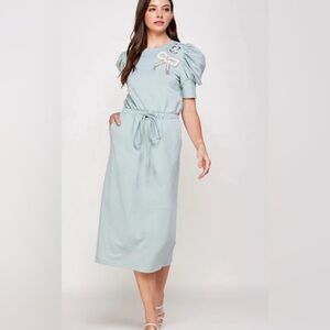 Light Blue Midi Dress with Bow Detail. Size large
